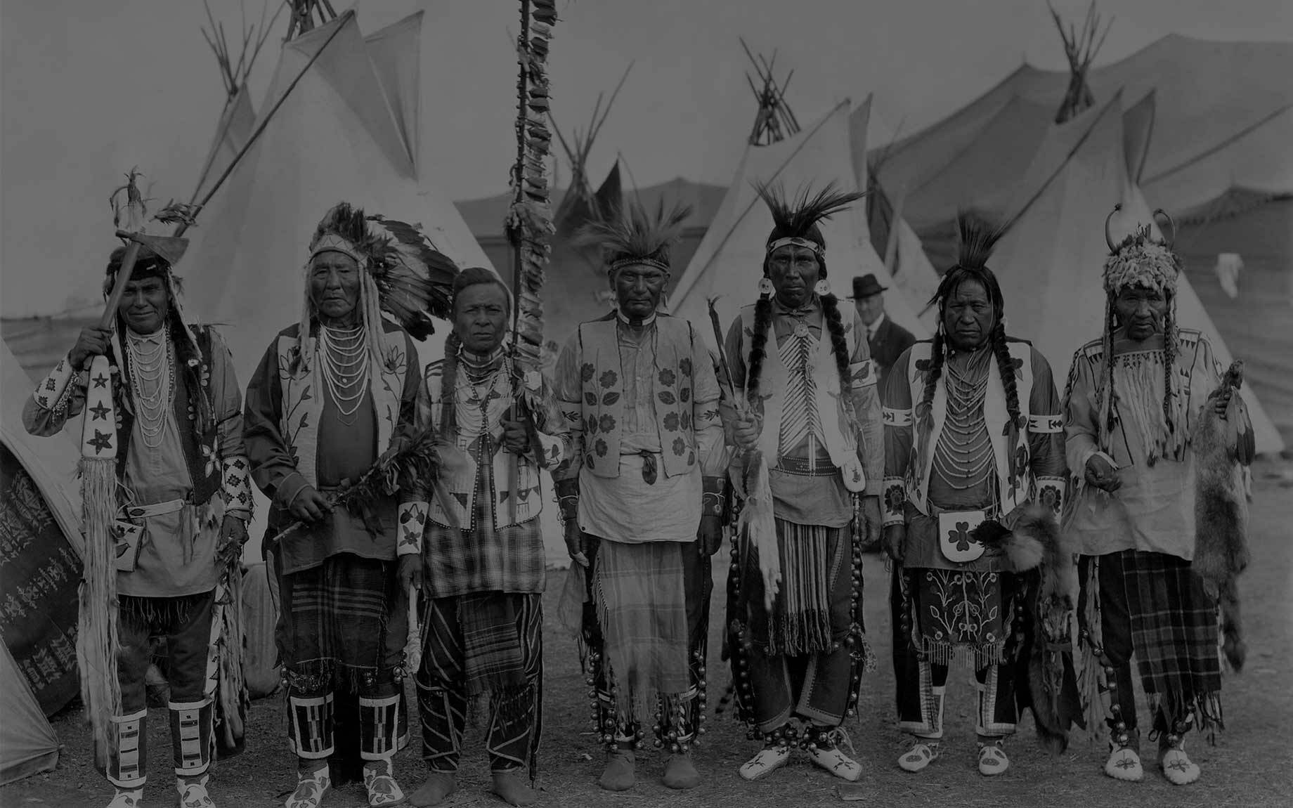 Kalispel Tribe members in traditional clothing
